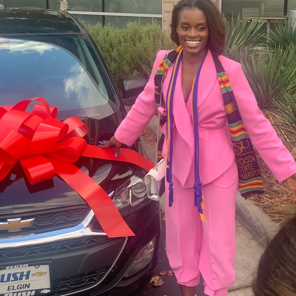 Two piece suit that comes with belt and ankle ties to produce the flared look - Picture 1 of 3